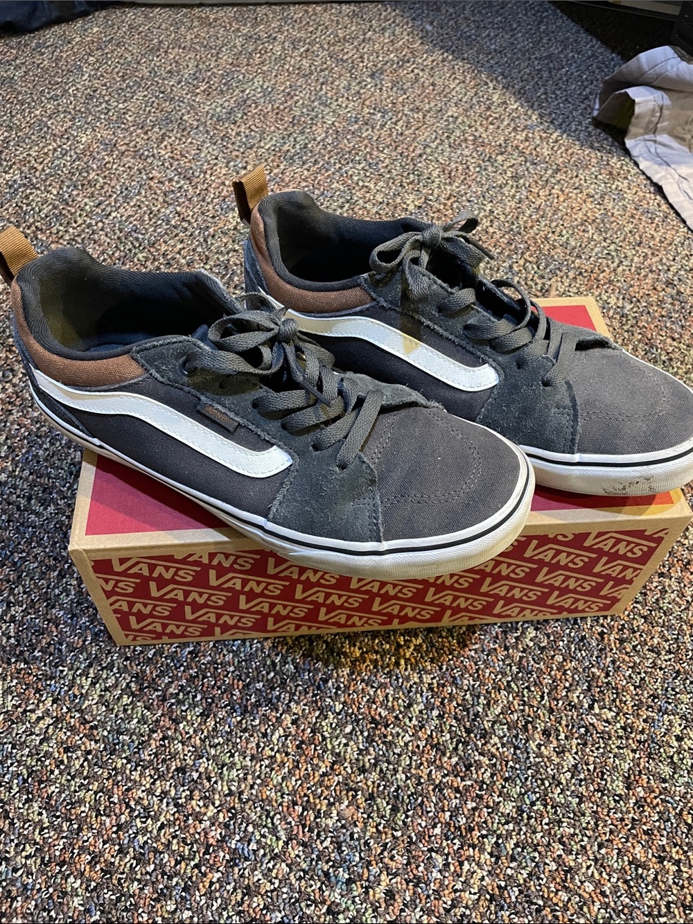 Vans Men’s Black and White Low-Top Sneakers with Brown Heel Accents
